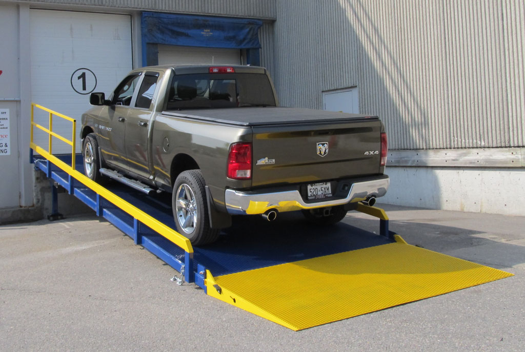 Ground to dock ramp with a pickup truck on it. Adapt-A-Ramp