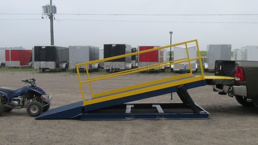 A lip plate on an Adapt-A-Ramp LD5000 loading ramp in use.