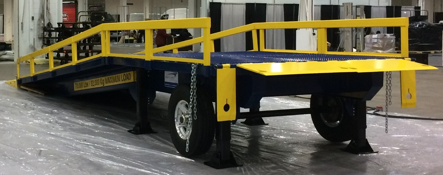 One of our four-piece lip plates on an Adapt-A-Ramp M35 Series 10ft wide portable loading ramp.